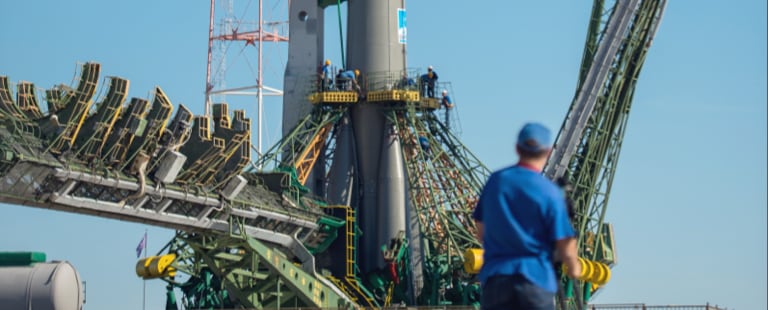 Man standing infront of a spaceport